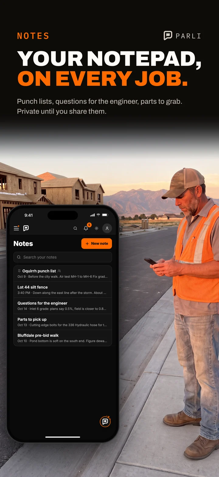 A foreman on a new street at sunset looks at his notes in Parli